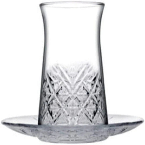 Clear glass vase with intricate design on a white background
